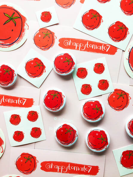 stickers and badges featuring Jo Brown's tomato illustration